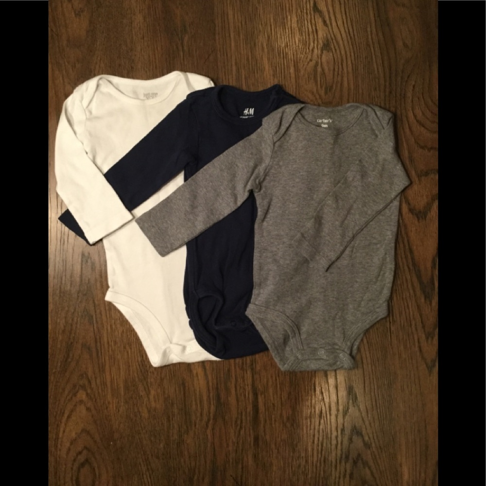 Set of 9 month long sleeved onesies